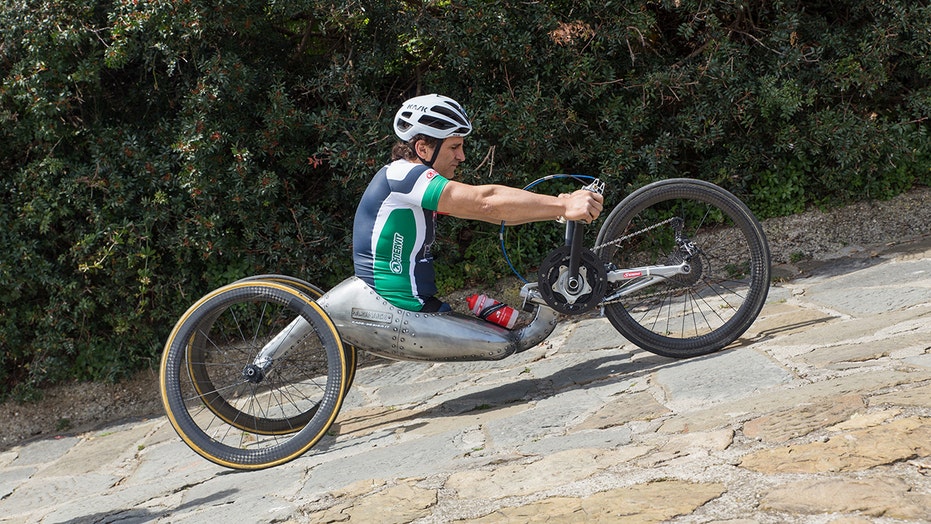 Auto racer Alex Zanardi released from hospital 18 months after cycling crash
